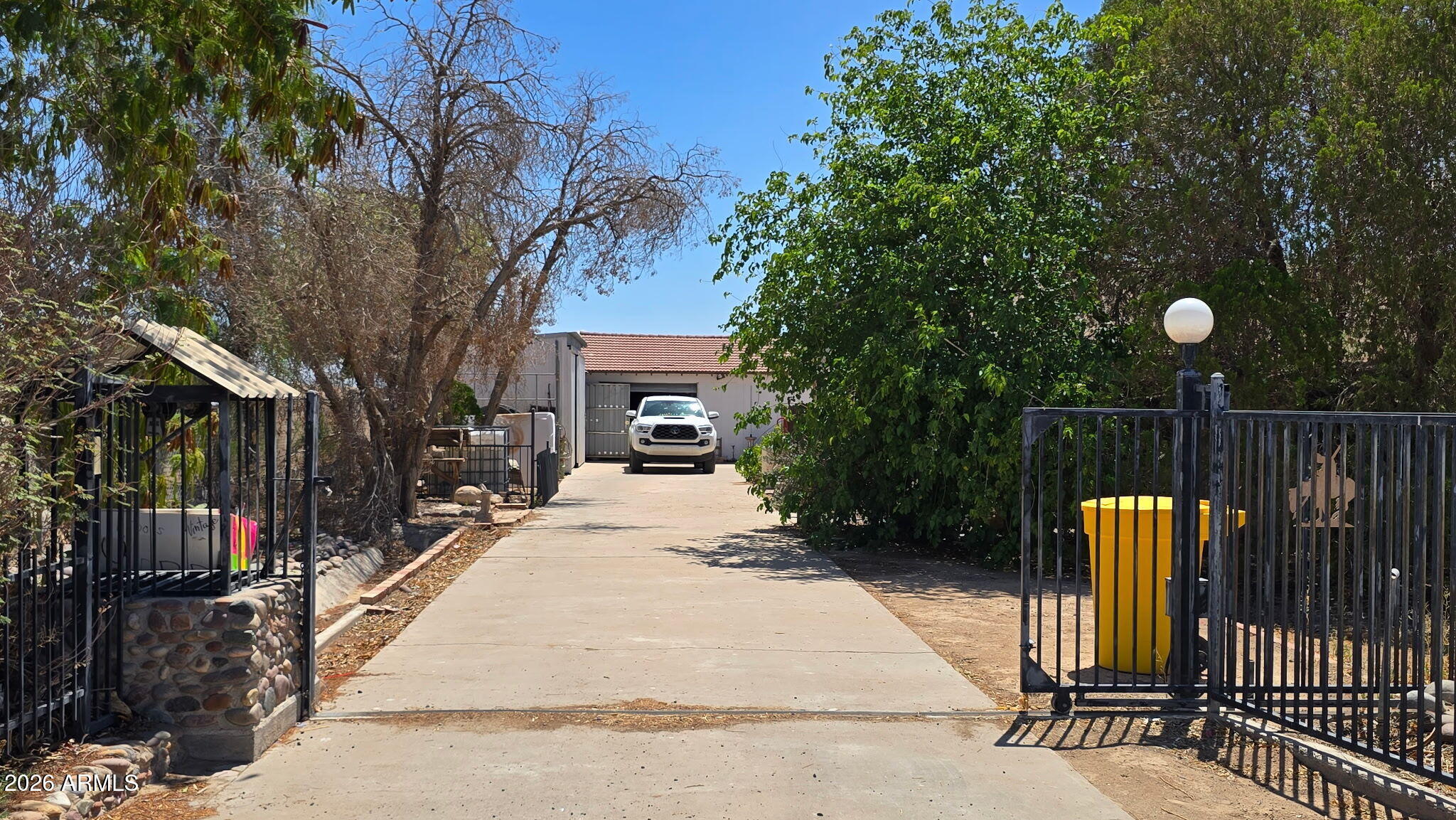 6803 South Miller Road Buckeye, AZ 85326 - Photo 6 of 50 a view of house with backyard and sitting area