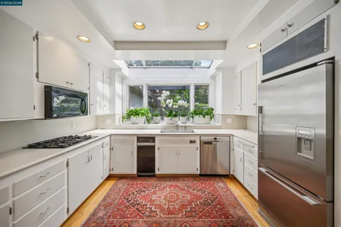 a bedroom with a bed and a view of bedroom