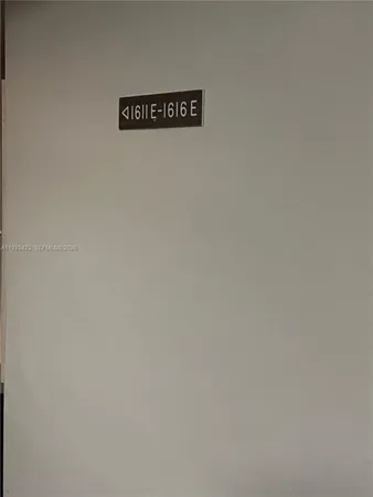a wall with a sign on it