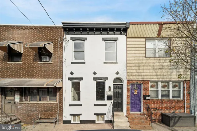 a view of a building with a street