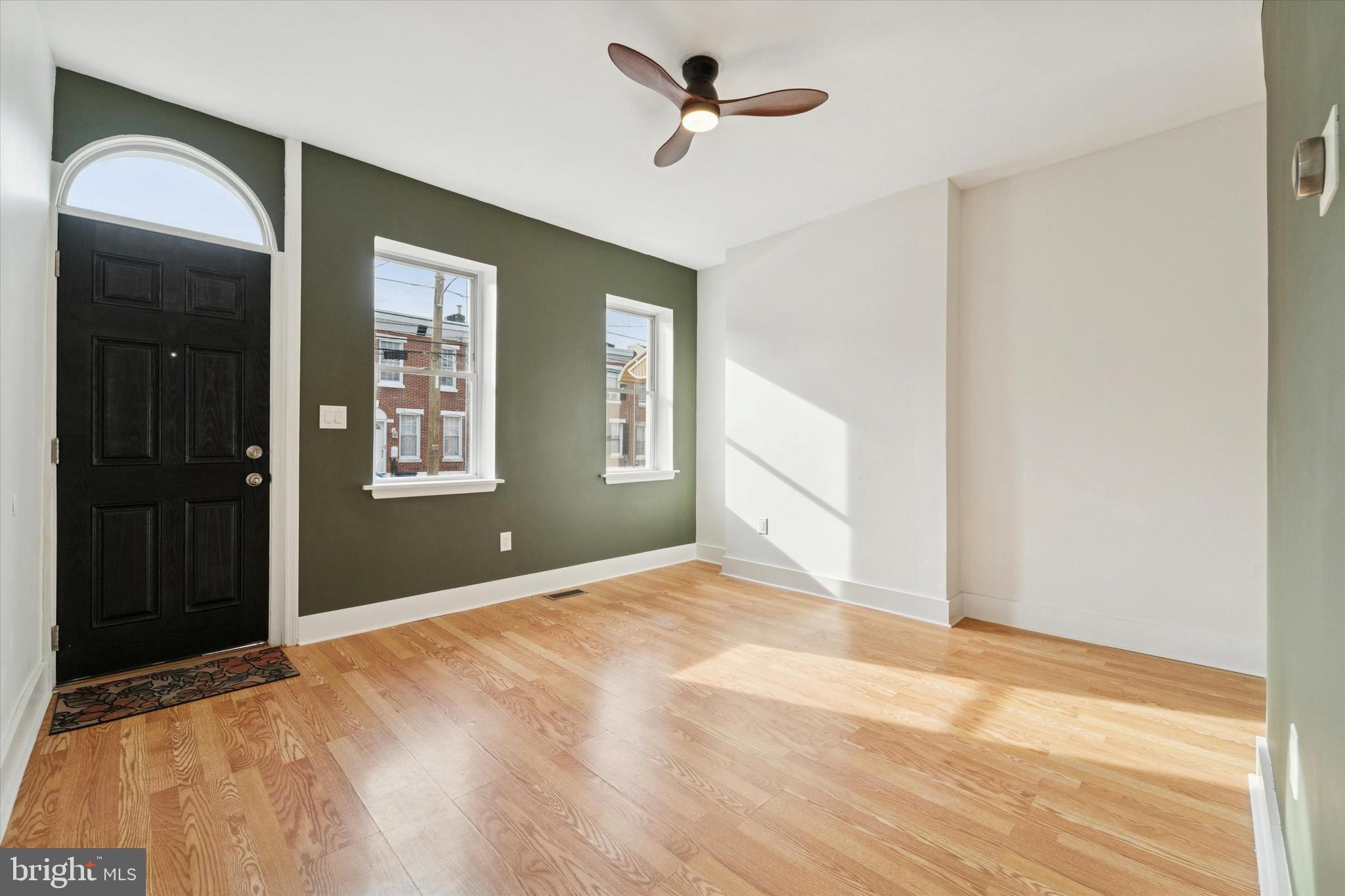 2353 East Huntingdon Street Philadelphia, PA 19125 - Photo 20 of 42 a view of an empty room with a window