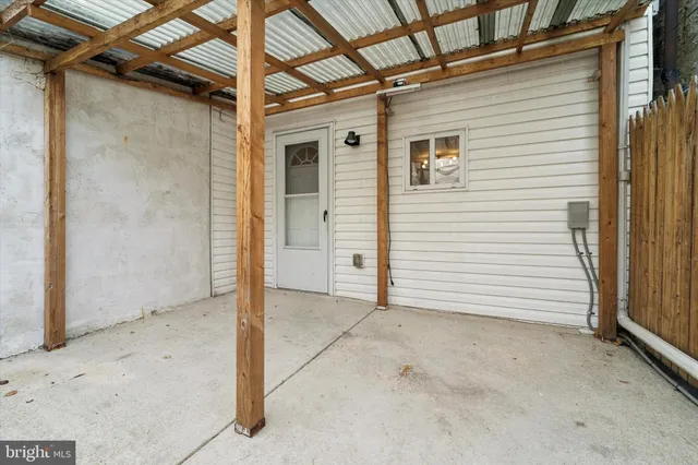a view of a house with white door