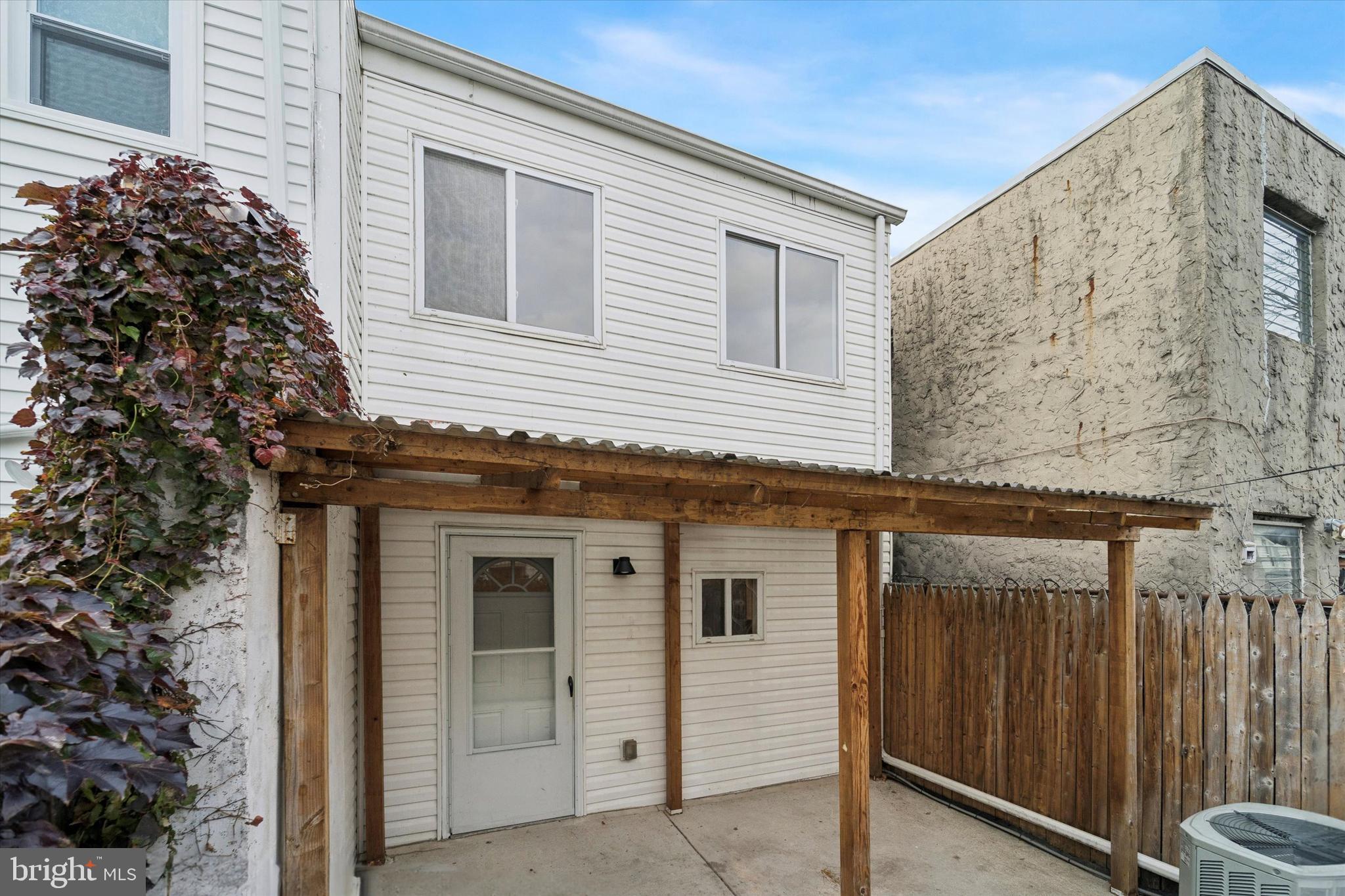 2353 East Huntingdon Street Philadelphia, PA 19125 - Photo 29 of 42 a view of a house with a door and wooden wall