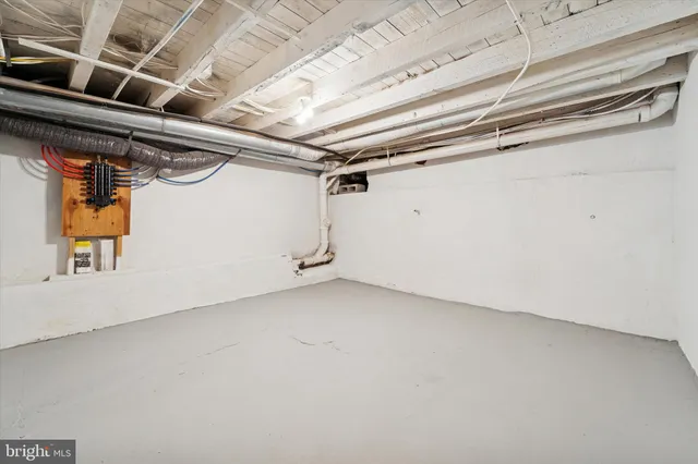 a view of a room with wooden walls