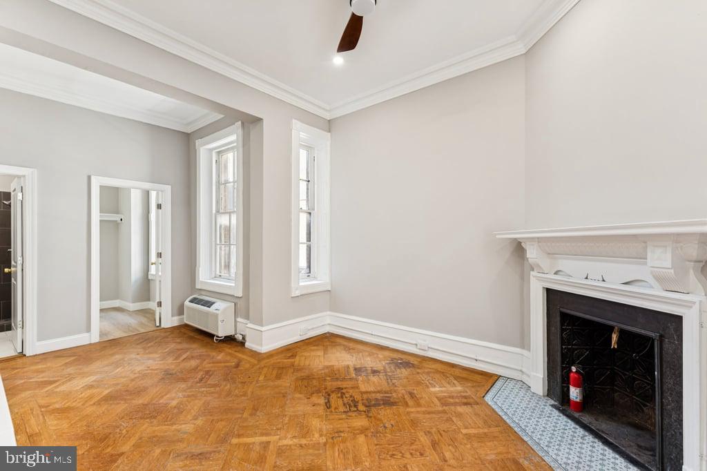 2101 Spruce Street, Unit 2R Philadelphia, PA 19103 - Photo 21 of 28 a view of empty room with window and fireplace
