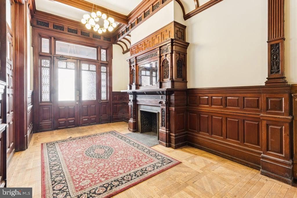 2101 Spruce Street, Unit 2R Philadelphia, PA 19103 - Photo 4 of 28 a view of a living room with a fireplace