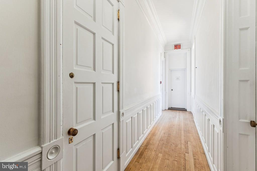 2101 Spruce Street, Unit 2R Philadelphia, PA 19103 - Photo 8 of 28 a view of a hallway with wooden floor and entryway