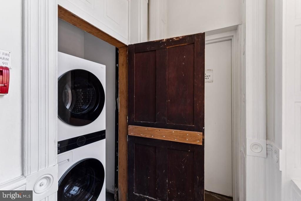2101 Spruce Street, Unit 2R Philadelphia, PA 19103 - Photo 9 of 28 a view of a hallway with washer and dryer