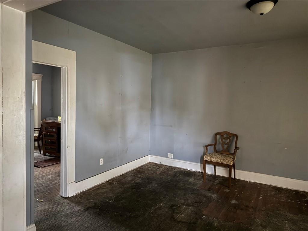 204 Cedar Avenue Sharon, PA 16146 - Photo 3 of 8 a room with workbench and window
