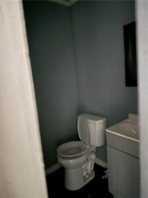 204 Cedar Avenue Sharon, PA 16146 - Photo 6 of 8 a white toilet sitting next to a white sink