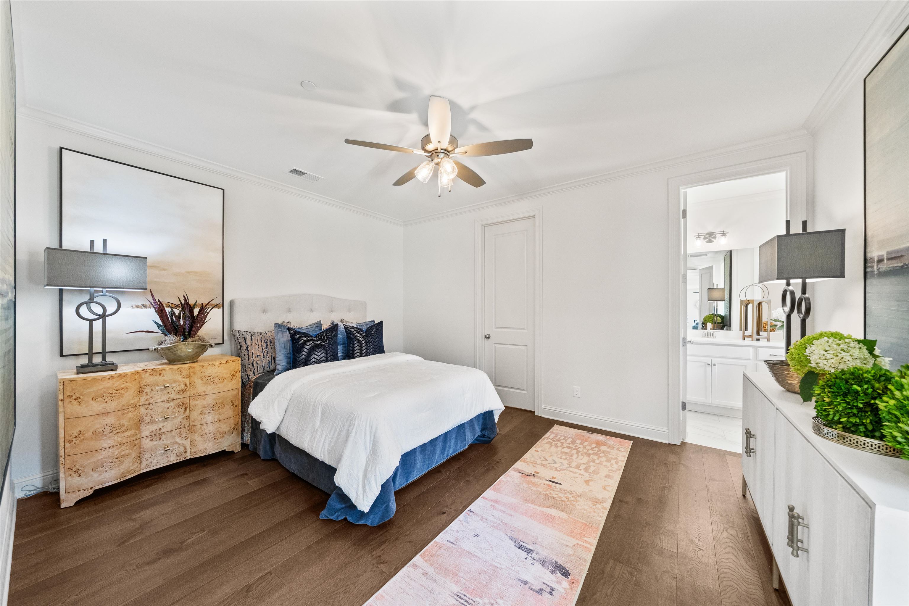 877 Ufton Alley Collierville, TN 38017 - Photo 21 of 36 a bedroom with a bed and a chandelier