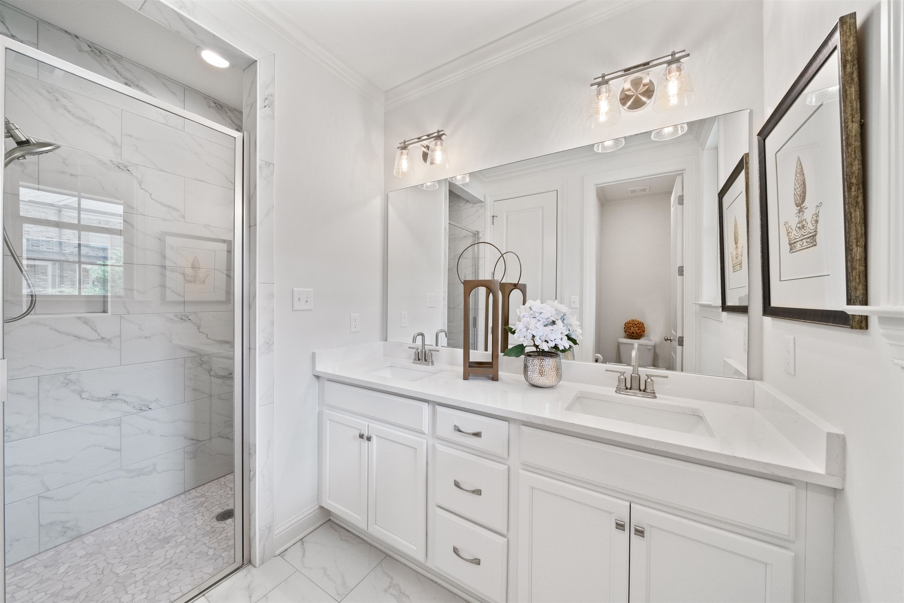 877 Ufton Alley Collierville, TN 38017 - Photo 22 of 36 a bathroom with double sink and a mirror