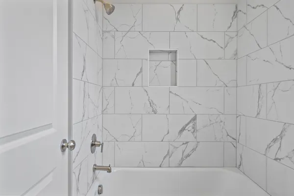 a bathroom with a bathtub
