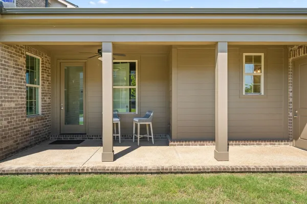 a house view with a backyard space