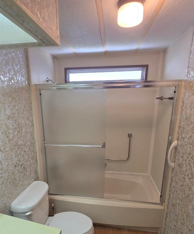 12501 Ulmerton Road, Unit 188 Largo, FL 33774 - Photo 24 of 63 a bathroom with a toilet and a shower