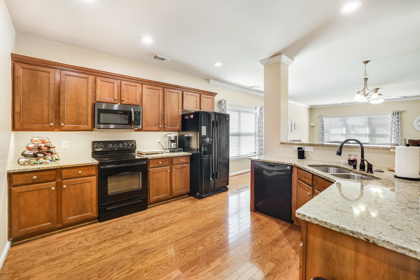 5239 New John Hagar Road Hermitage, TN 37076 - Photo 13 of 70 a kitchen with stainless steel appliances granite countertop a sink dishwasher stove top oven and refrigerator