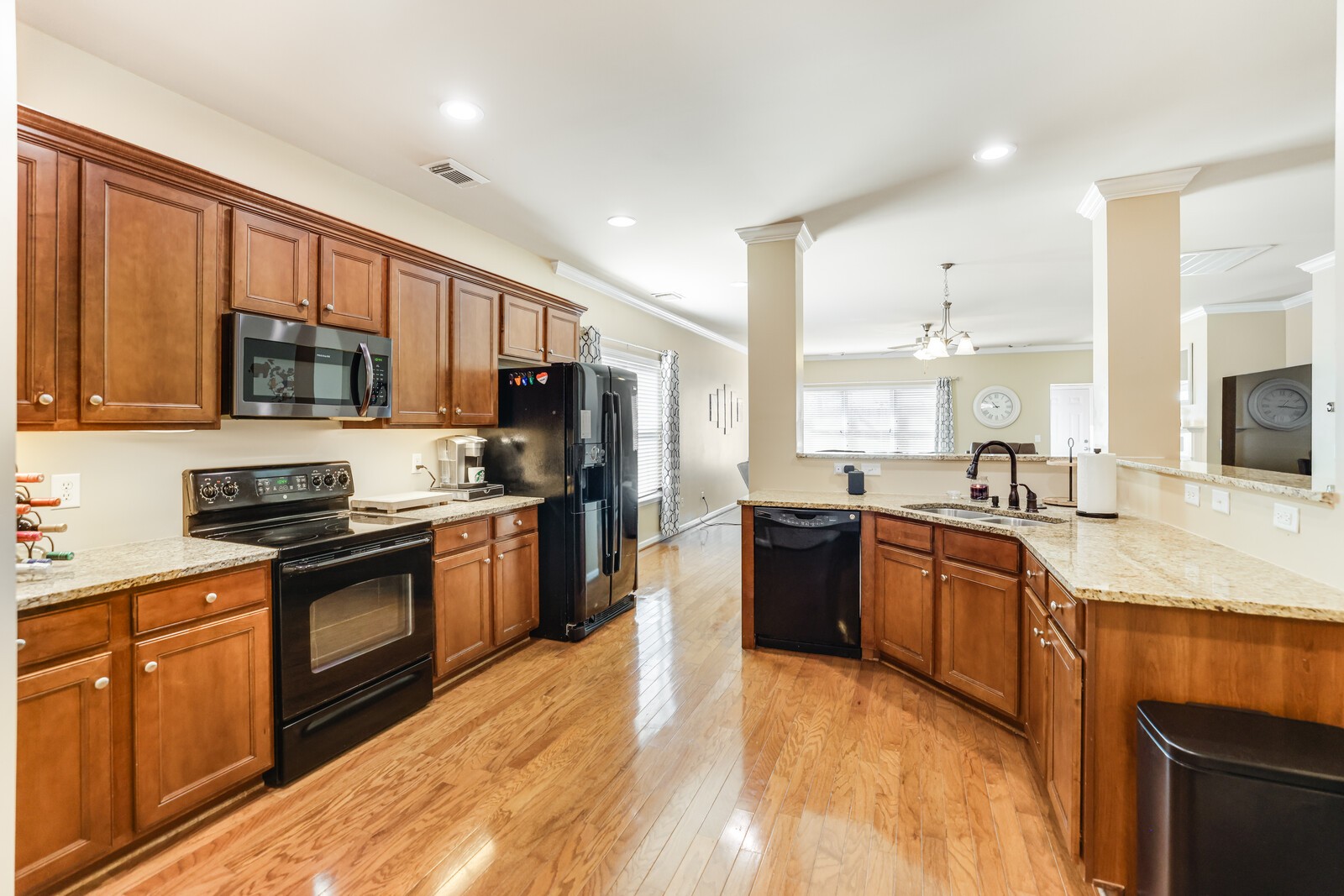 5239 New John Hagar Road Hermitage, TN 37076 - Photo 14 of 70 a large kitchen with stainless steel appliances granite countertop a stove refrigerator sink and cabinets