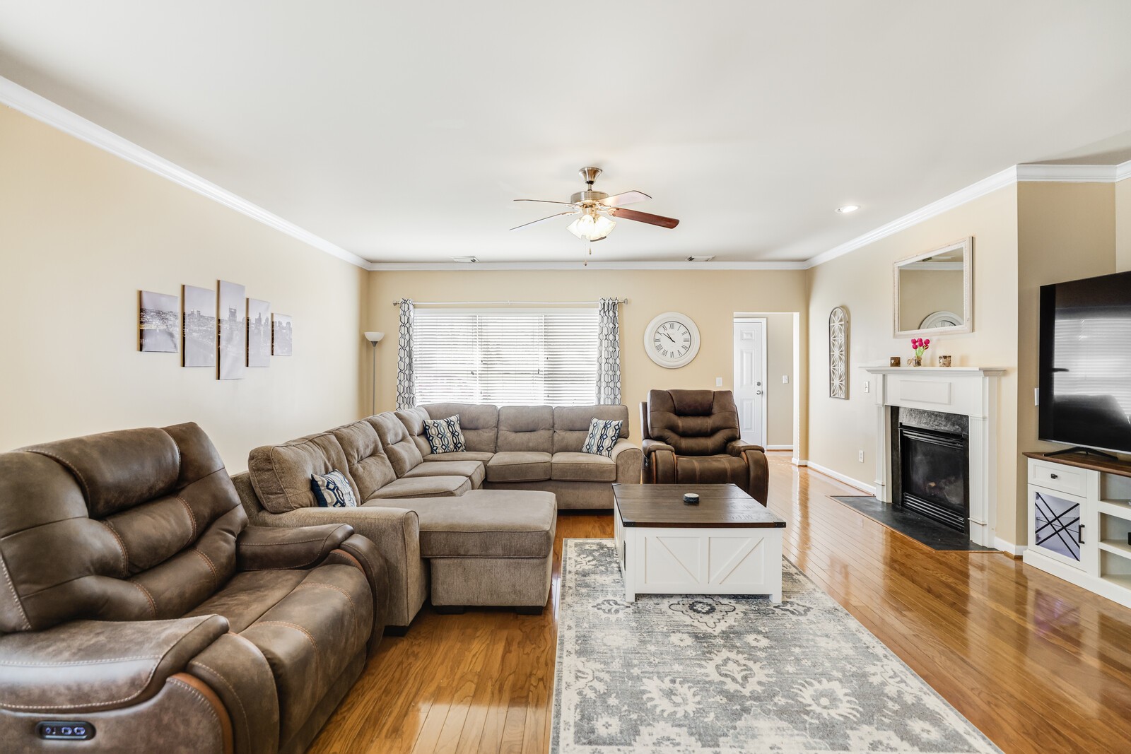 5239 New John Hagar Road Hermitage, TN 37076 - Photo 23 of 70 a living room with furniture flat screen tv and a fireplace