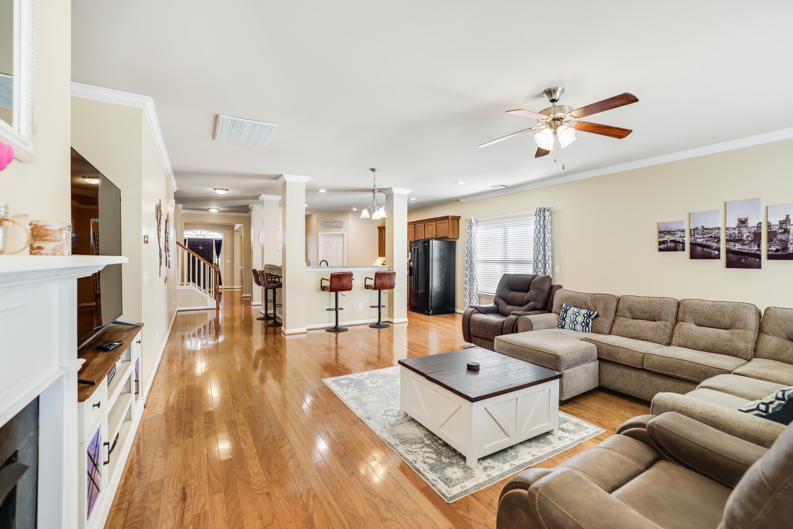 5239 New John Hagar Road Hermitage, TN 37076 - Photo 27 of 70 a living room with furniture fireplace and flat screen tv