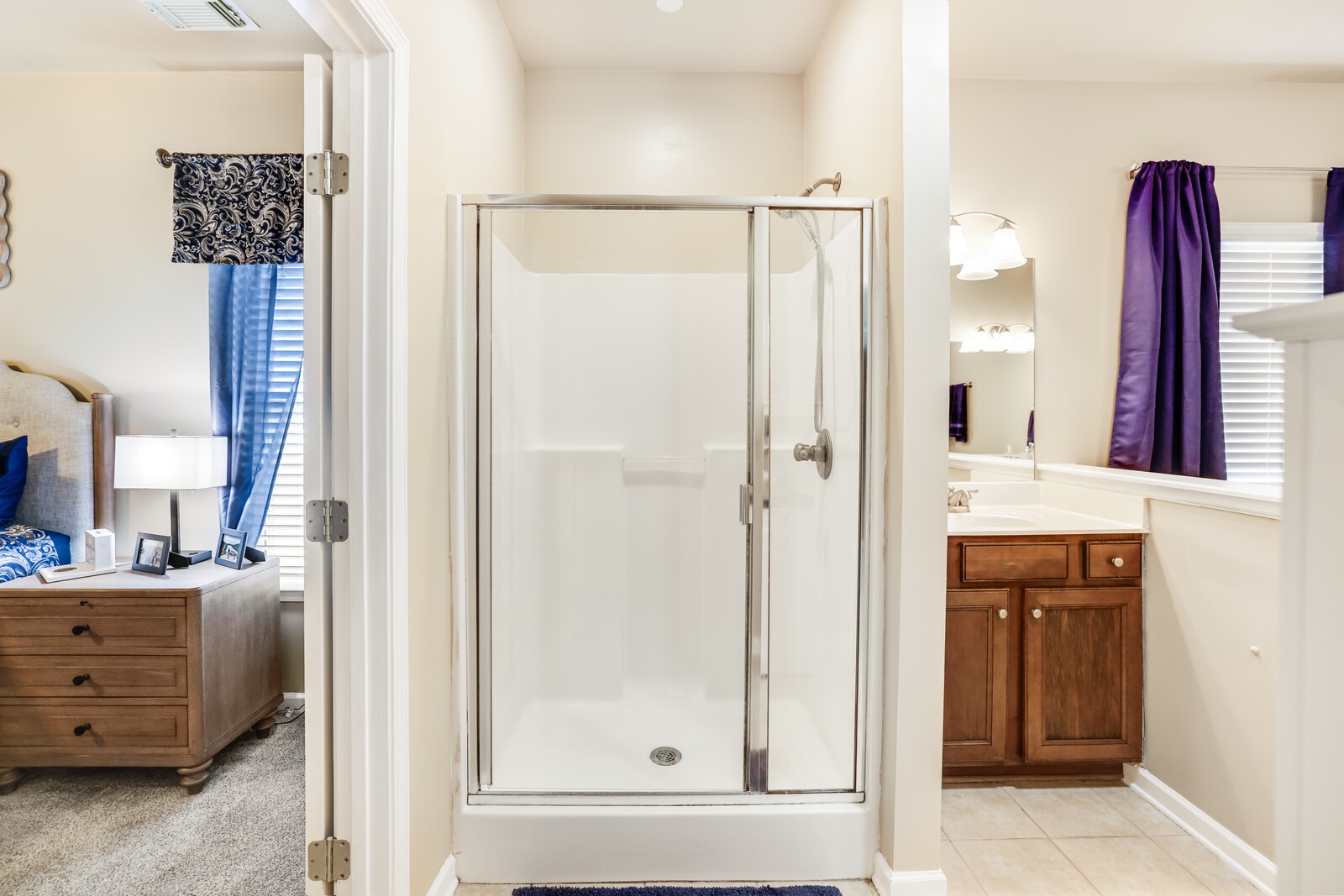 5239 New John Hagar Road Hermitage, TN 37076 - Photo 33 of 70 a bathroom with a double vanity sink and a mirror