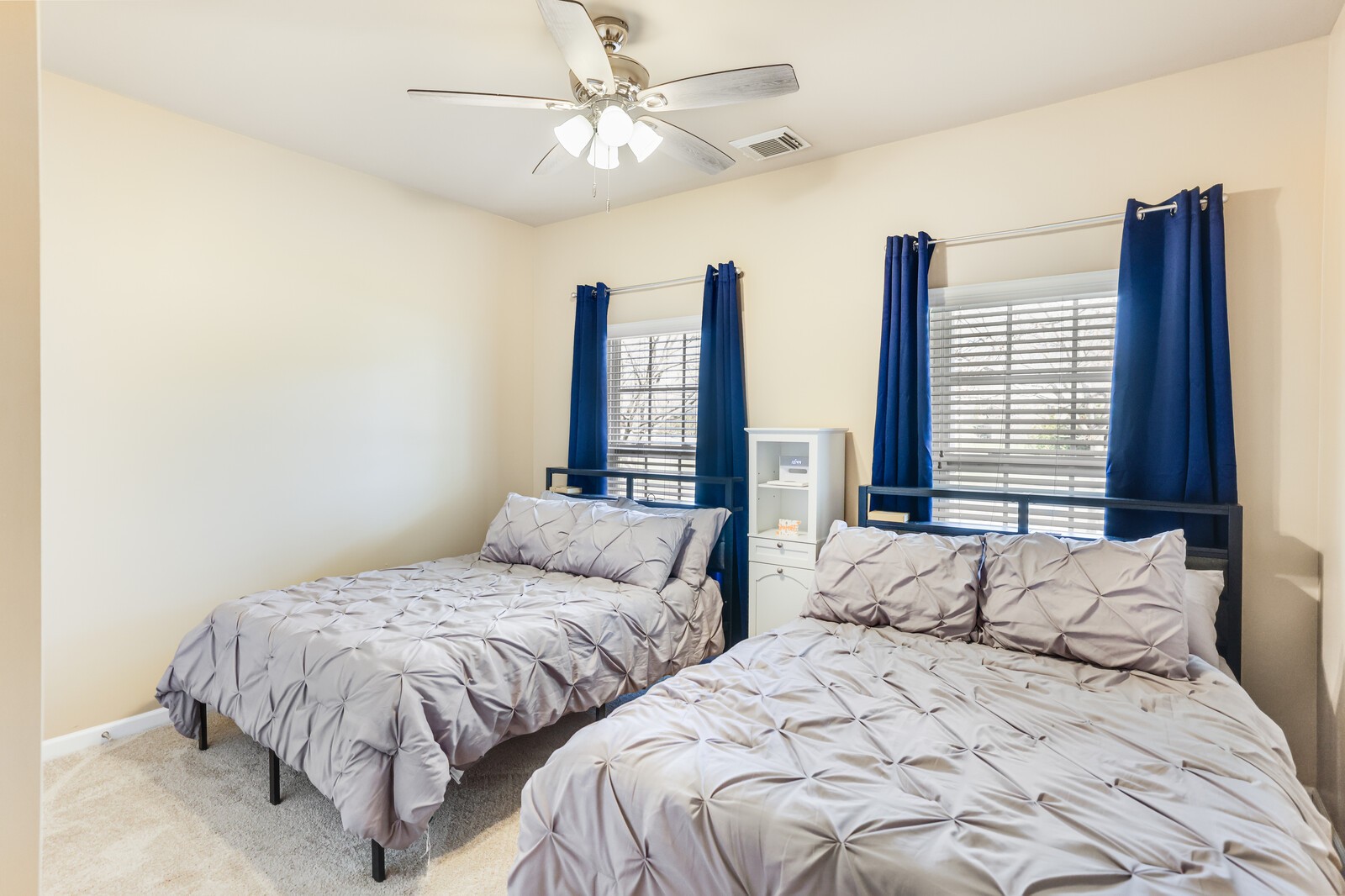 5239 New John Hagar Road Hermitage, TN 37076 - Photo 41 of 70 a bedroom with two large bed and a large window