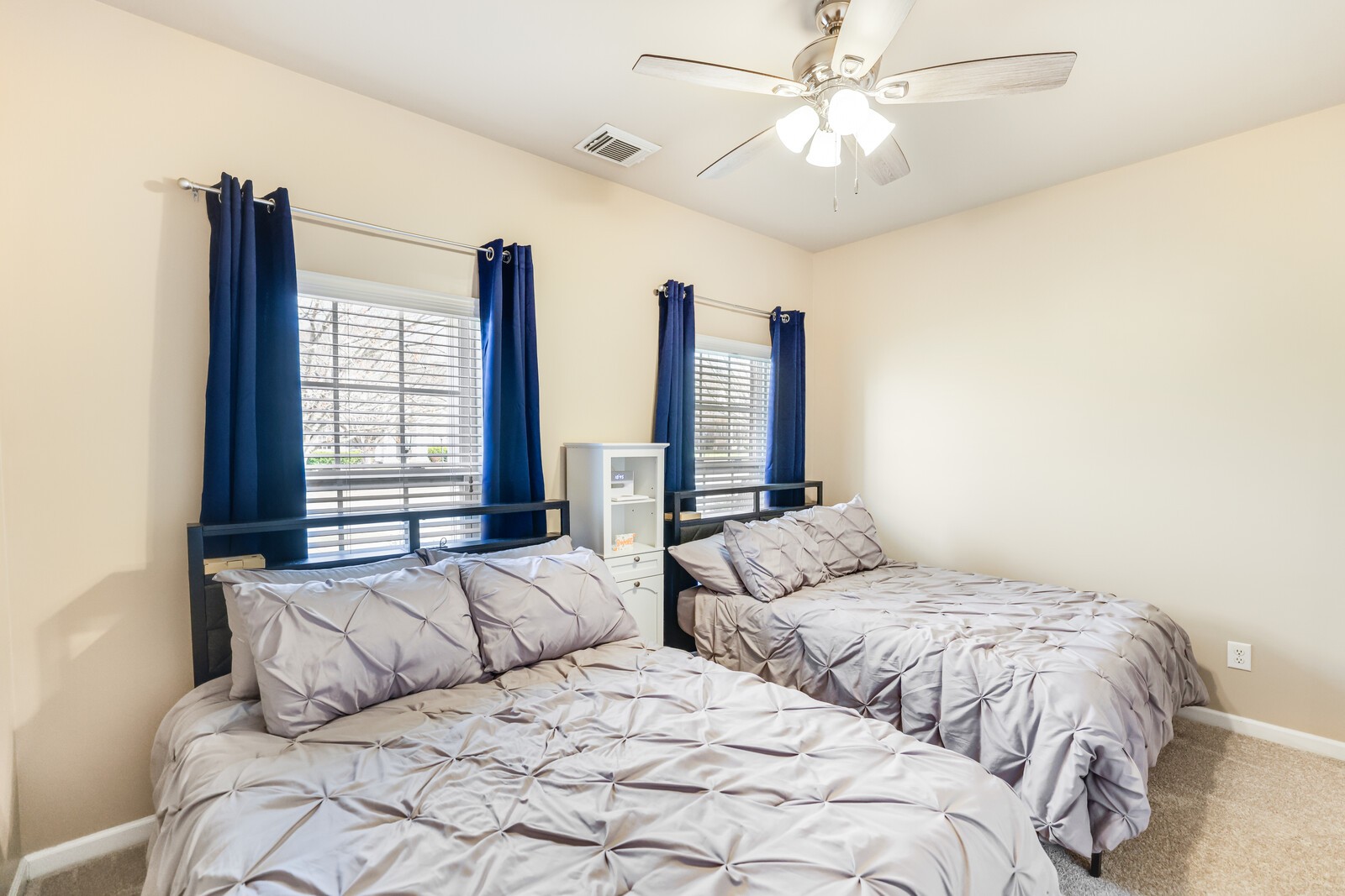 5239 New John Hagar Road Hermitage, TN 37076 - Photo 42 of 70 a bedroom with two large bed and a large window