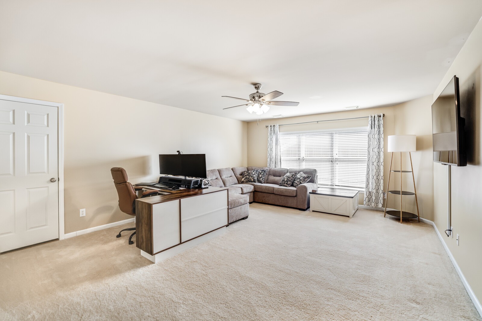 5239 New John Hagar Road Hermitage, TN 37076 - Photo 45 of 70 a living room with furniture and a flat screen tv
