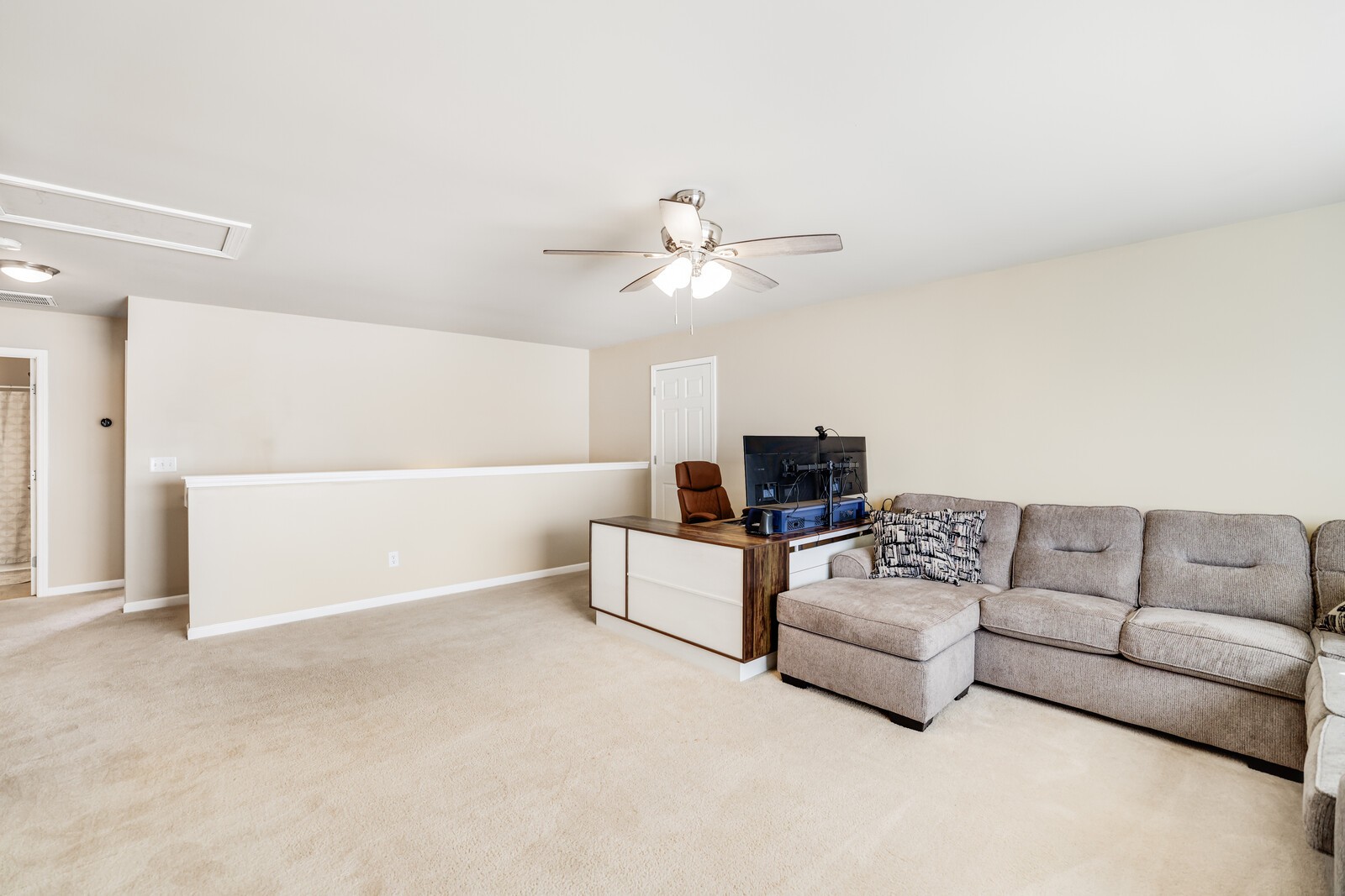5239 New John Hagar Road Hermitage, TN 37076 - Photo 47 of 70 a living room with furniture and a ceiling fan