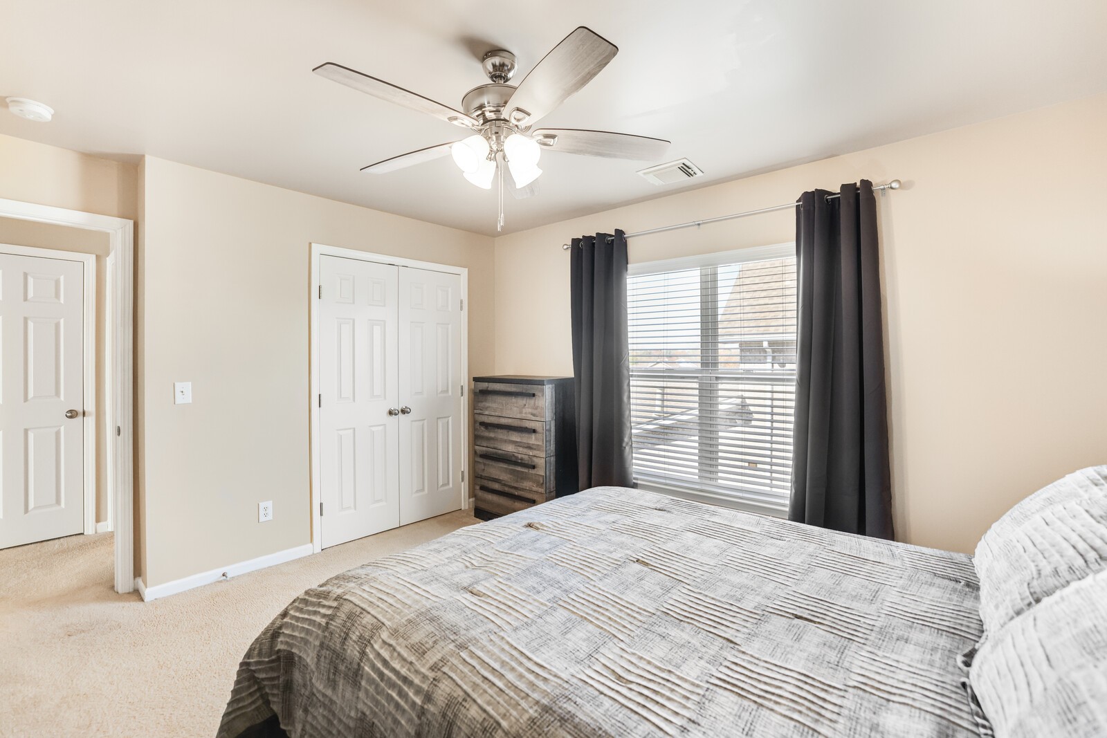 5239 New John Hagar Road Hermitage, TN 37076 - Photo 51 of 70 a bedroom with a large bed and a large mirror