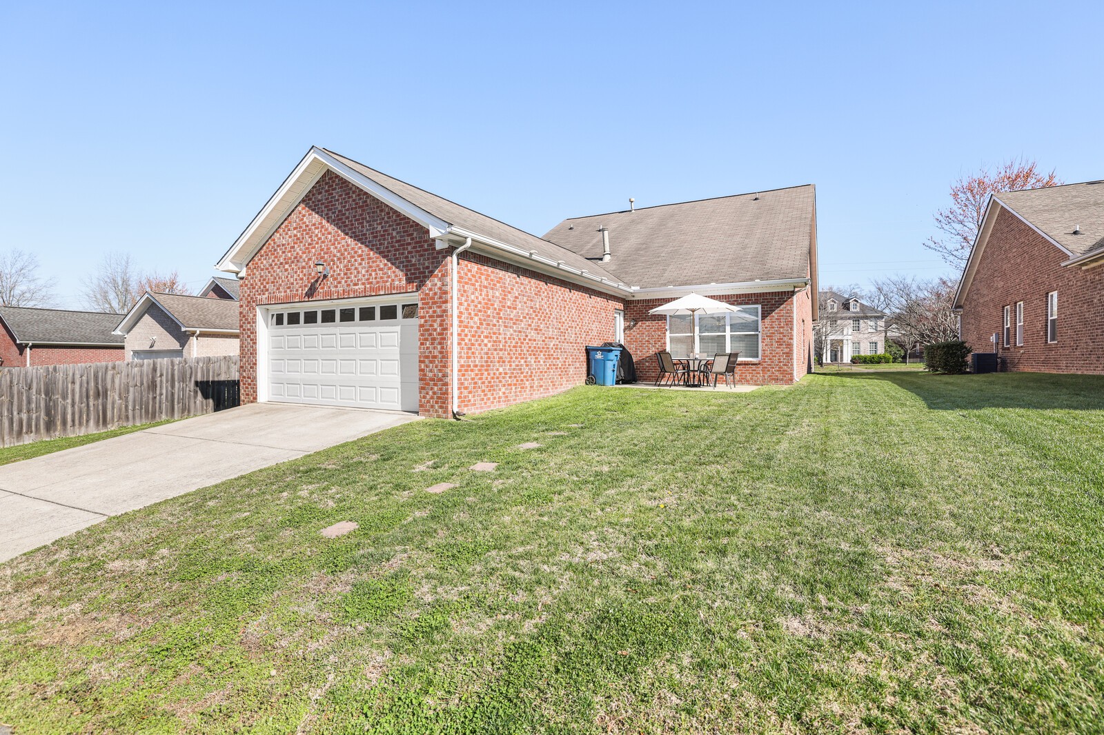 5239 New John Hagar Road Hermitage, TN 37076 - Photo 60 of 70 a front view of a house with a yard and garage