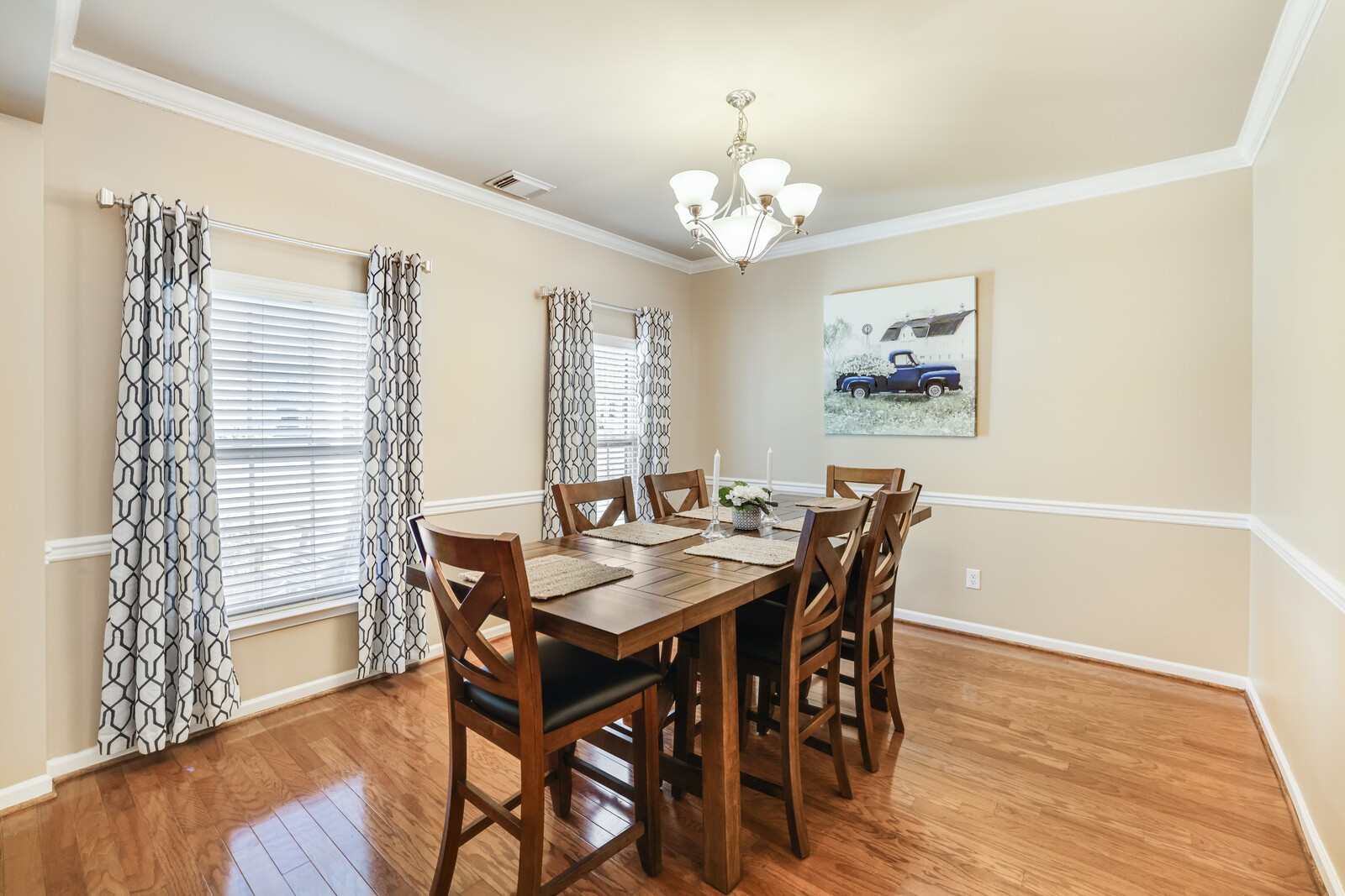 5239 New John Hagar Road Hermitage, TN 37076 - Photo 8 of 70 a view of a dining room with furniture wooden floor and chandelier