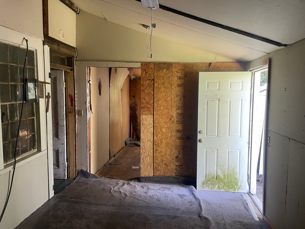 3216 North Main Street Fall River, MA 02720 - Photo 16 of 42 a bedroom with window and walk in closet