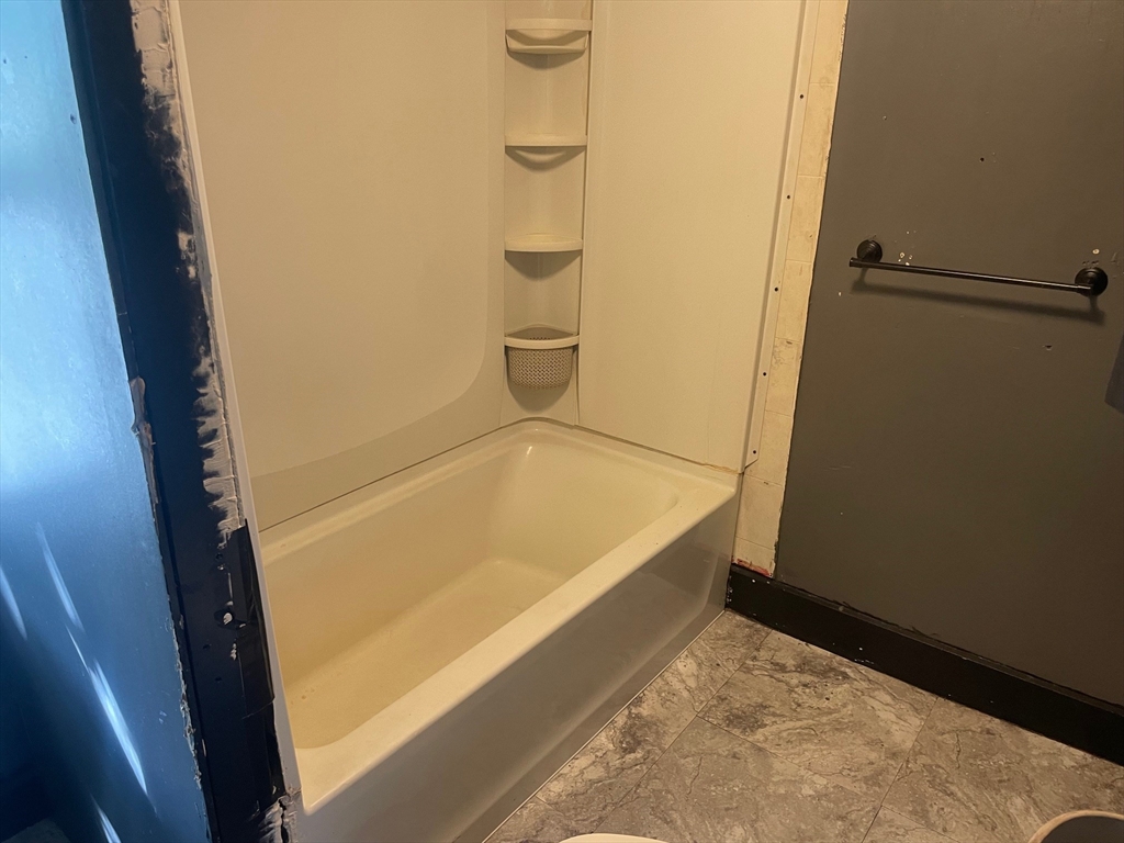 3216 North Main Street Fall River, MA 02720 - Photo 30 of 42 a bathroom with a tub