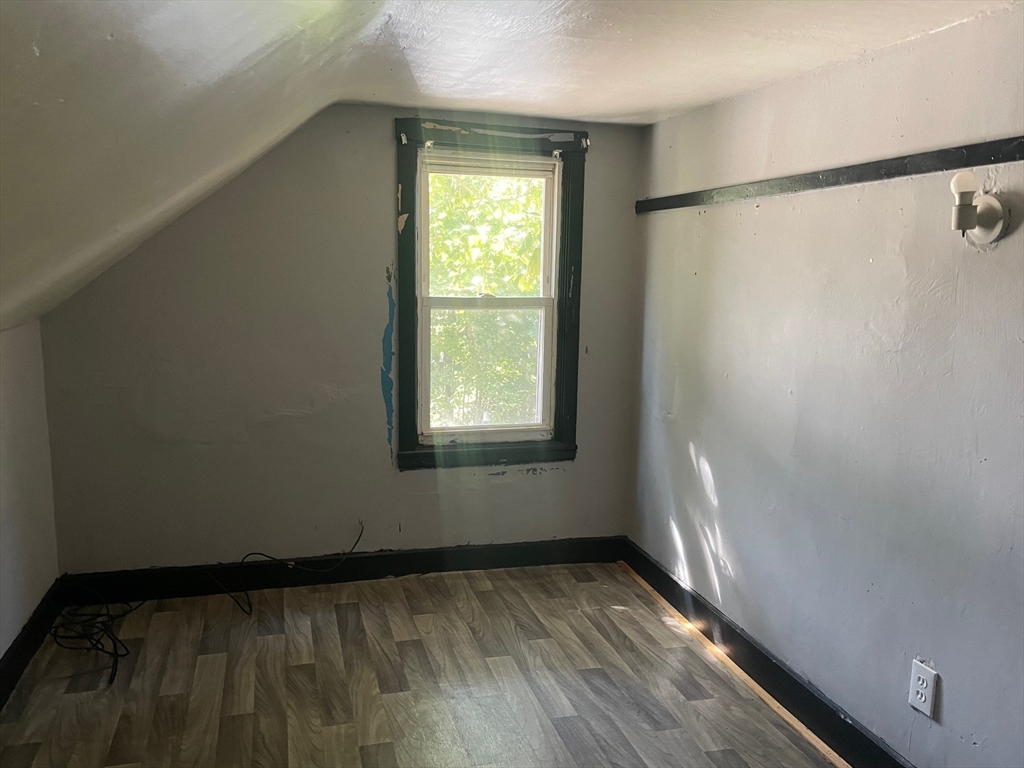 3216 North Main Street Fall River, MA 02720 - Photo 32 of 42 a view of an empty room and a window