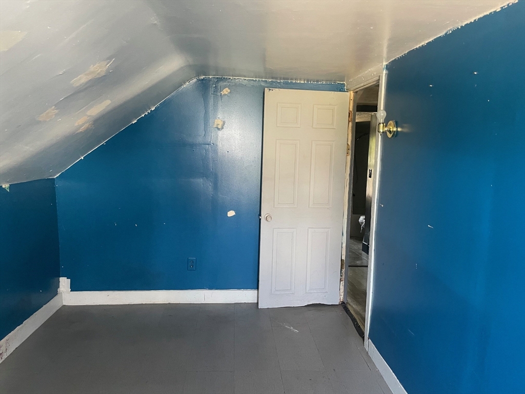 3216 North Main Street Fall River, MA 02720 - Photo 35 of 42 an empty room with wooden floor