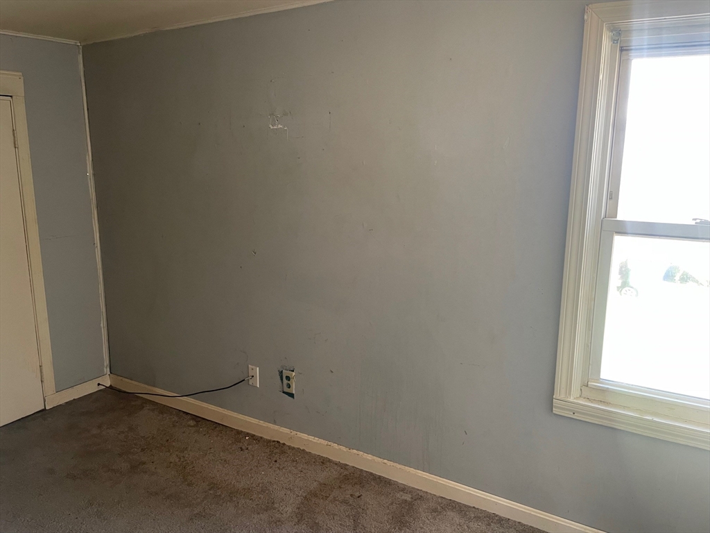 3216 North Main Street Fall River, MA 02720 - Photo 36 of 42 a room that has a window in it