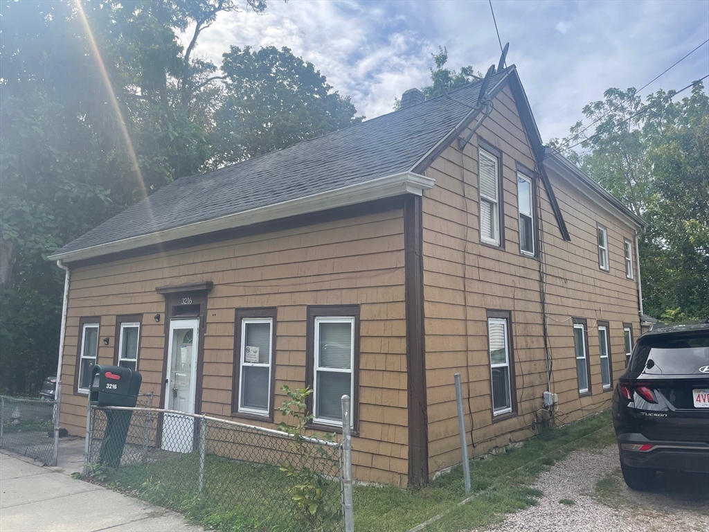 3216 North Main Street Fall River, MA 02720 - Photo 40 of 42 a view of a house with a yard