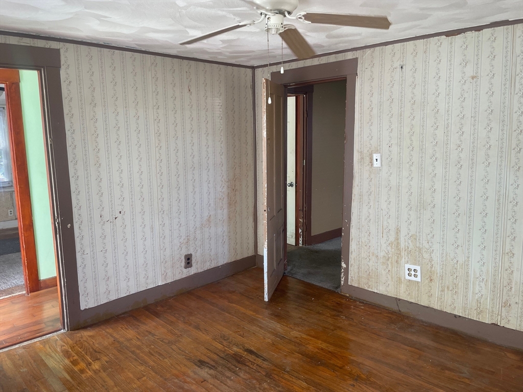 3216 North Main Street Fall River, MA 02720 - Photo 4 of 42 a view of a room with wooden floor and entryway