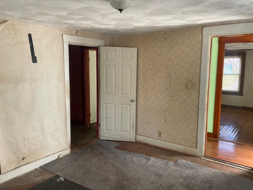 3216 North Main Street Fall River, MA 02720 - Photo 6 of 42 an empty room with windows