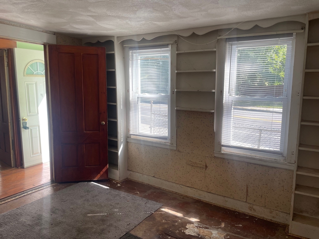 3216 North Main Street Fall River, MA 02720 - Photo 7 of 42 an empty room with windows