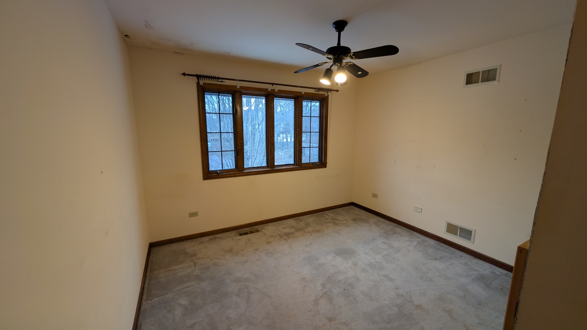 1102 O'Plaine Road Waukegan, IL 60085 - Photo 17 of 41 a view of an empty room with a window