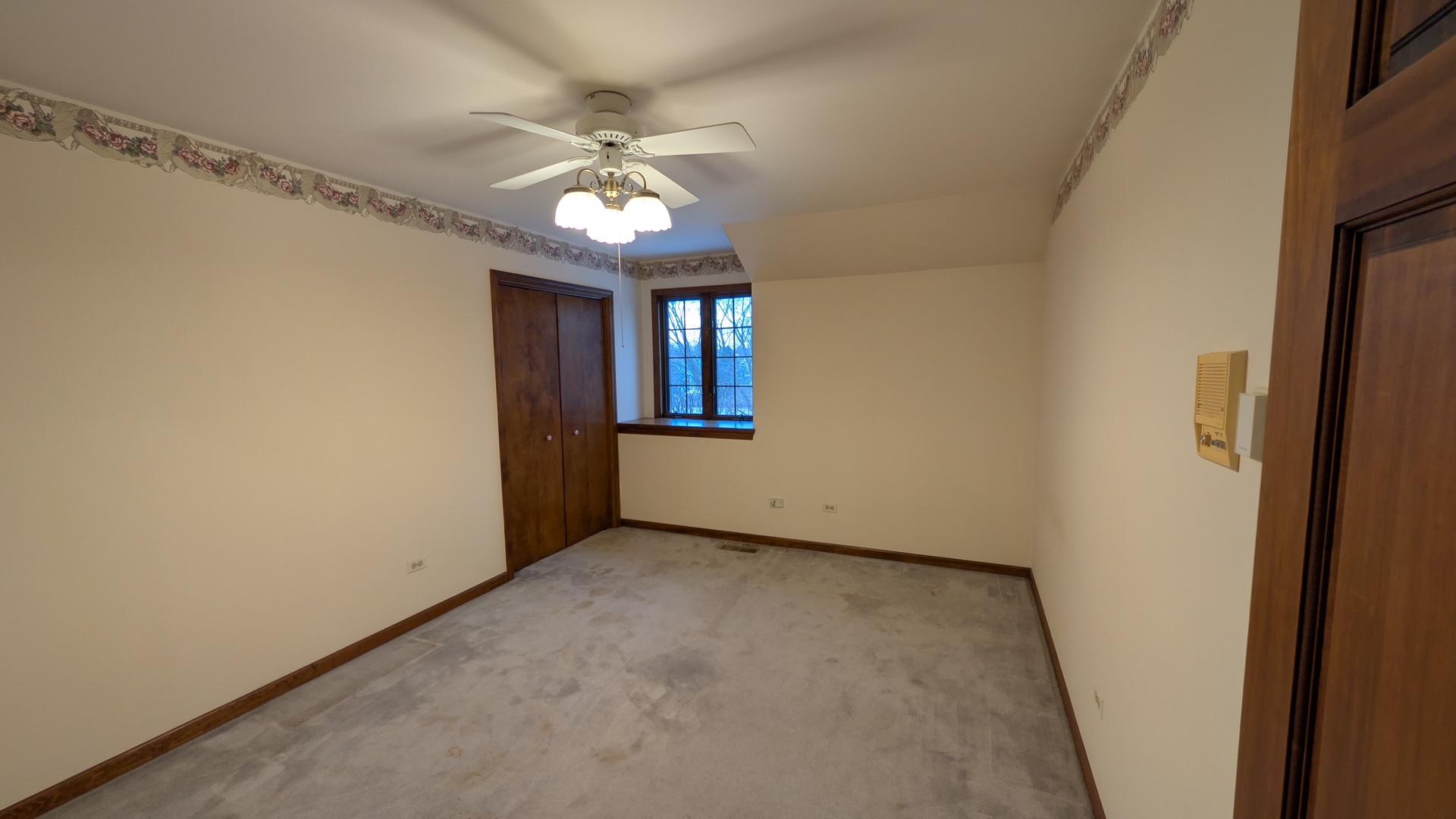 1102 O'Plaine Road Waukegan, IL 60085 - Photo 18 of 41 a view of an empty room with a chandelier fan