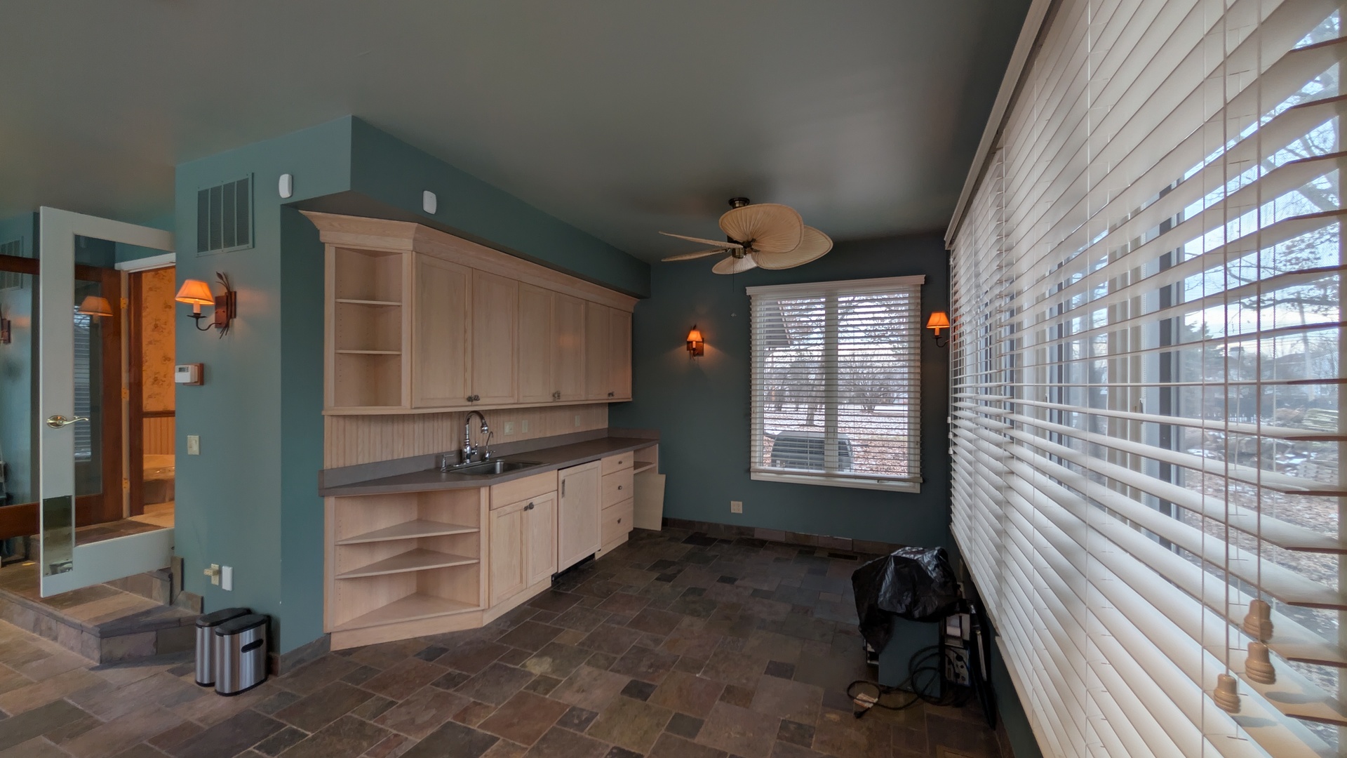 1102 O'Plaine Road Waukegan, IL 60085 - Photo 10 of 41 a bathroom with a sink a toilet and a mirror