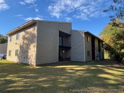6400 Starbrook Drive, Unit 7 Fayetteville, NC 28304 - Photo 12 of 12 a view of a house with backyard and trees