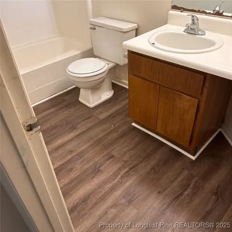 a bathroom with a sink and a toilet
