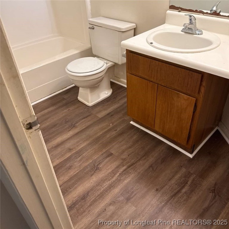 6400 Starbrook Drive, Unit 7 Fayetteville, NC 28304 - Photo 6 of 12 a bathroom with a sink and a toilet