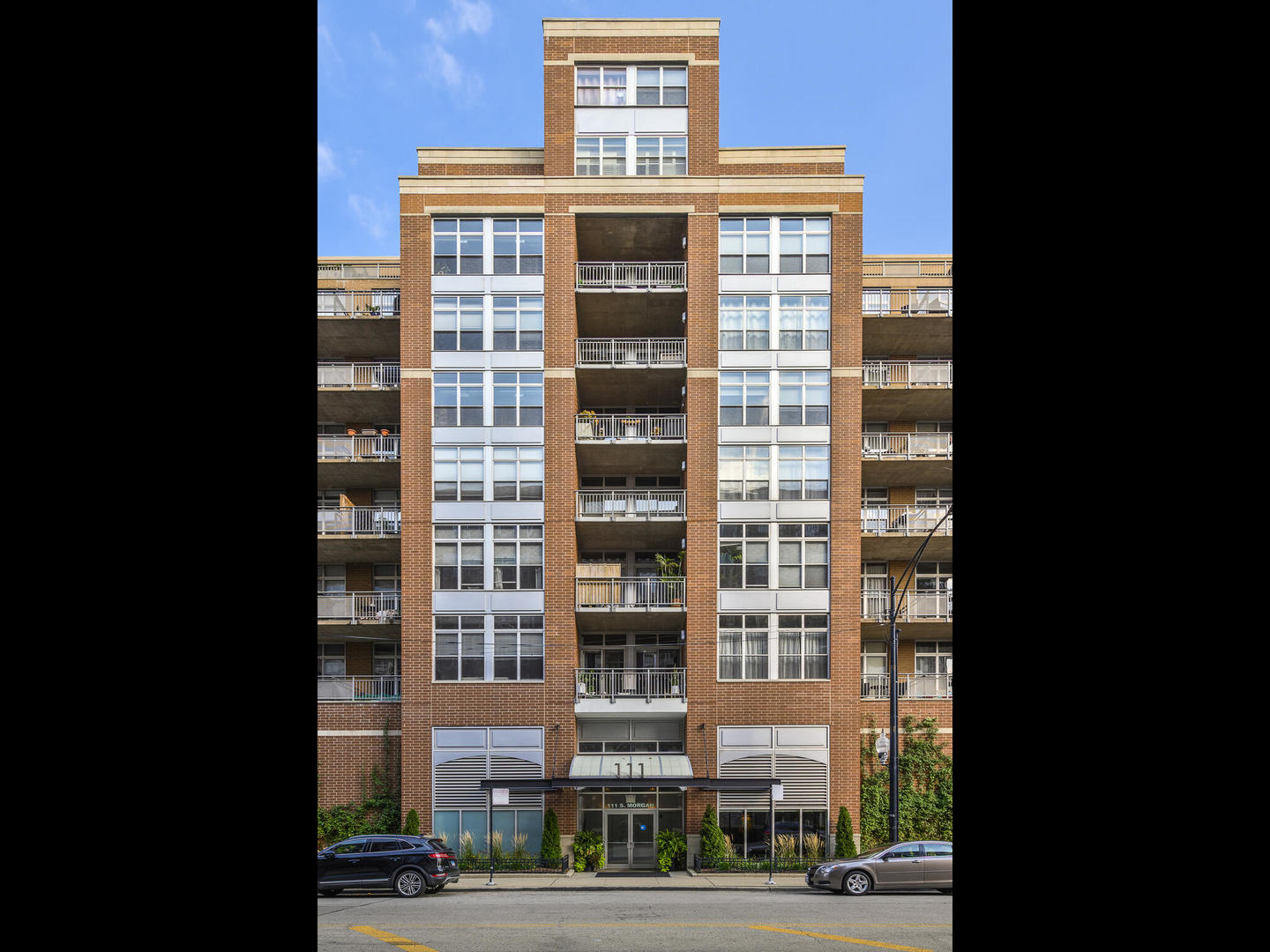 111 South Morgan Street, Unit 811 Chicago, IL 60607 - Photo 2 of 21 a front view of a building