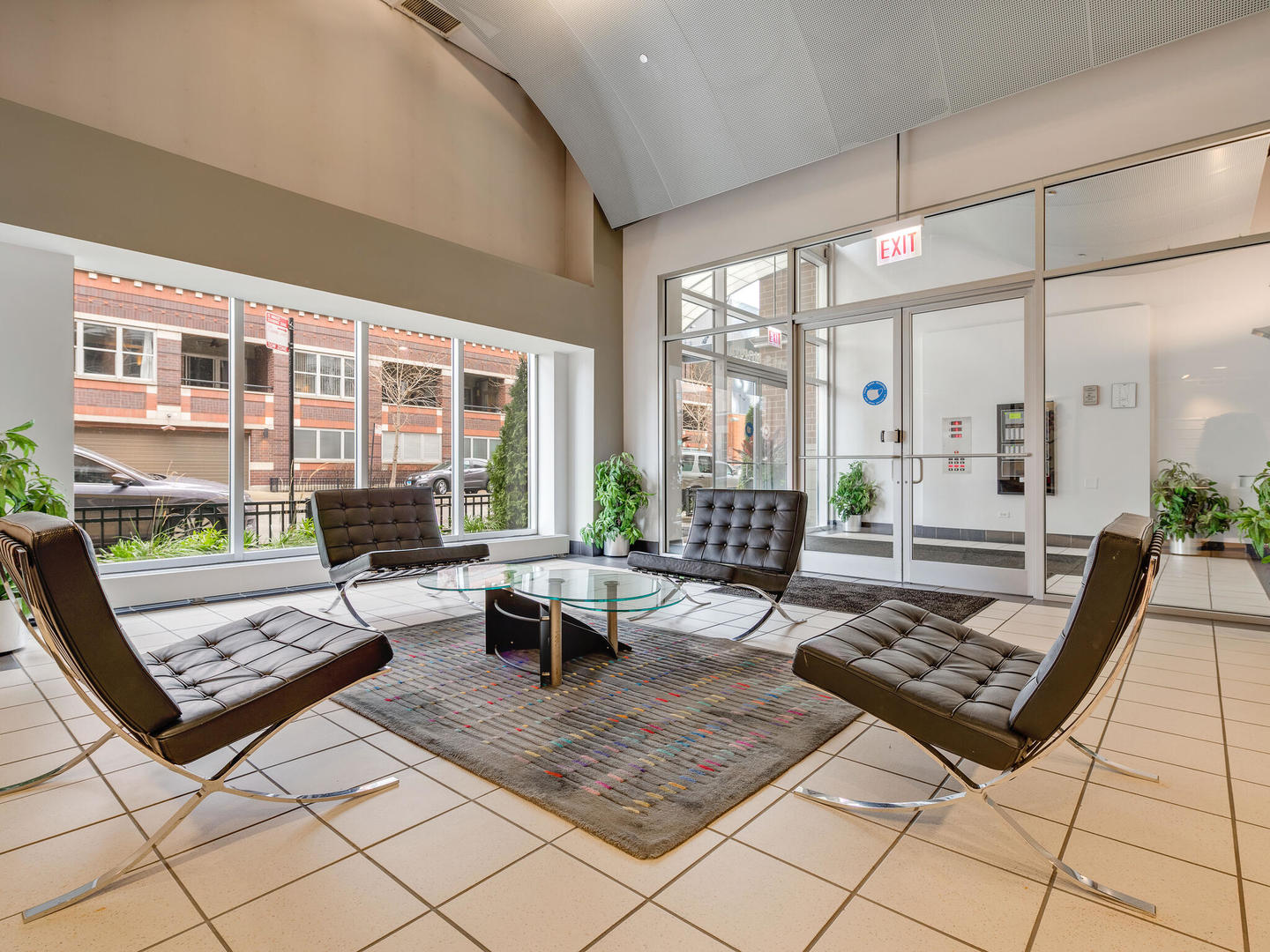 111 South Morgan Street, Unit 811 Chicago, IL 60607 - Photo 21 of 21 a living room with patio furniture and a table