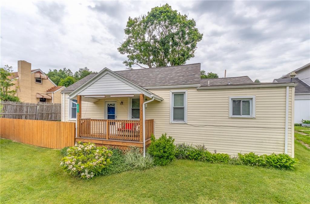 601 Virginia Avenue Rochester, PA 15074 - Photo 2 of 23 a view of a house with a garden