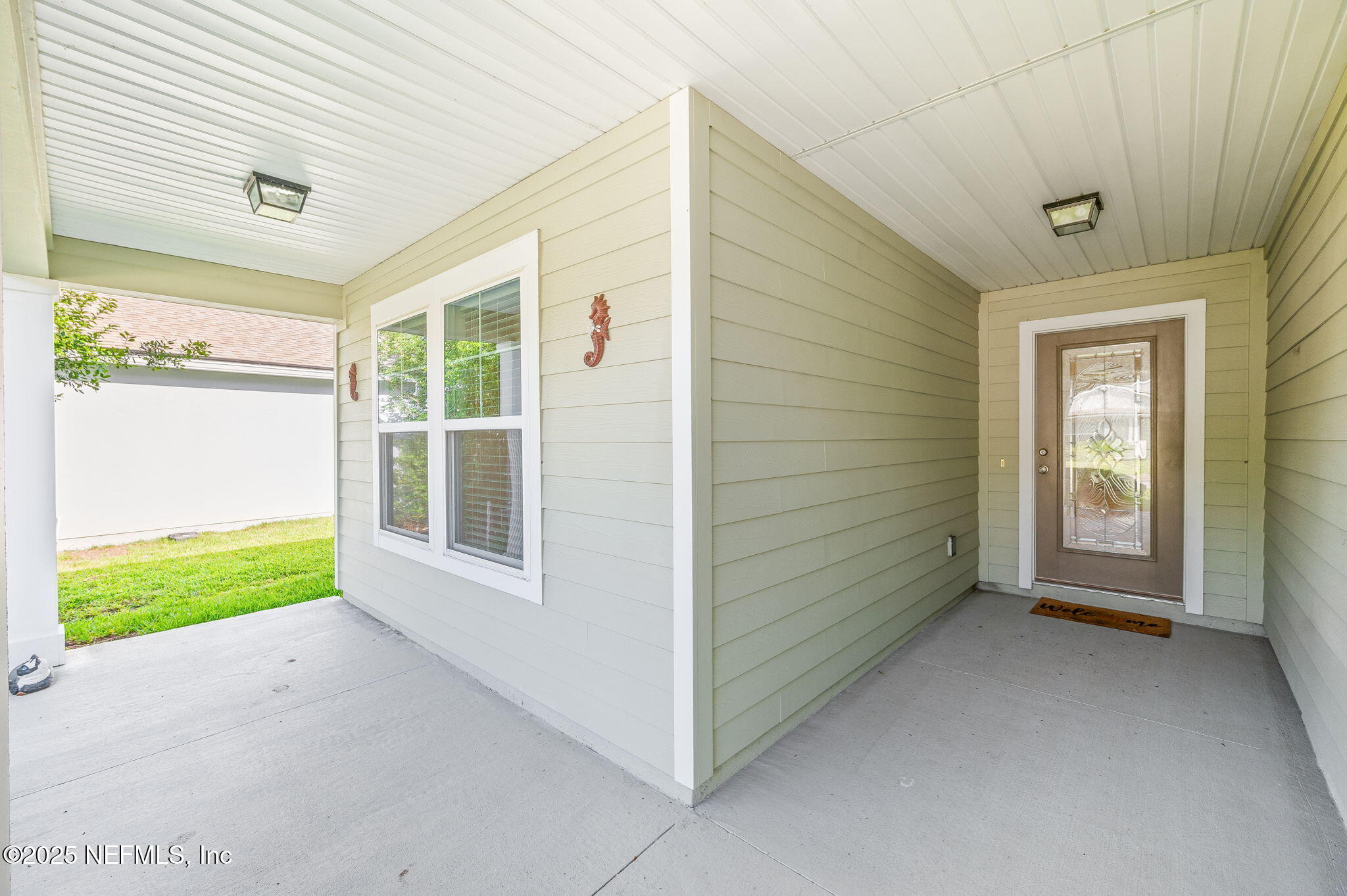 305 Green Turtle Lane St. Augustine, FL 32086 - Photo 6 of 39 a view of an empty room and a window